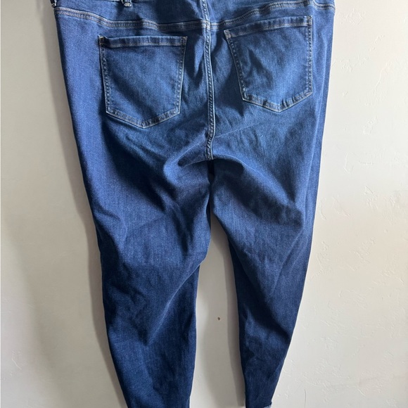 Torrid Blue Skinny Pants with Distressed Hem - Picture 9 of 11
